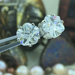 925 Sterling Silver Star faceted Flower CZ earring